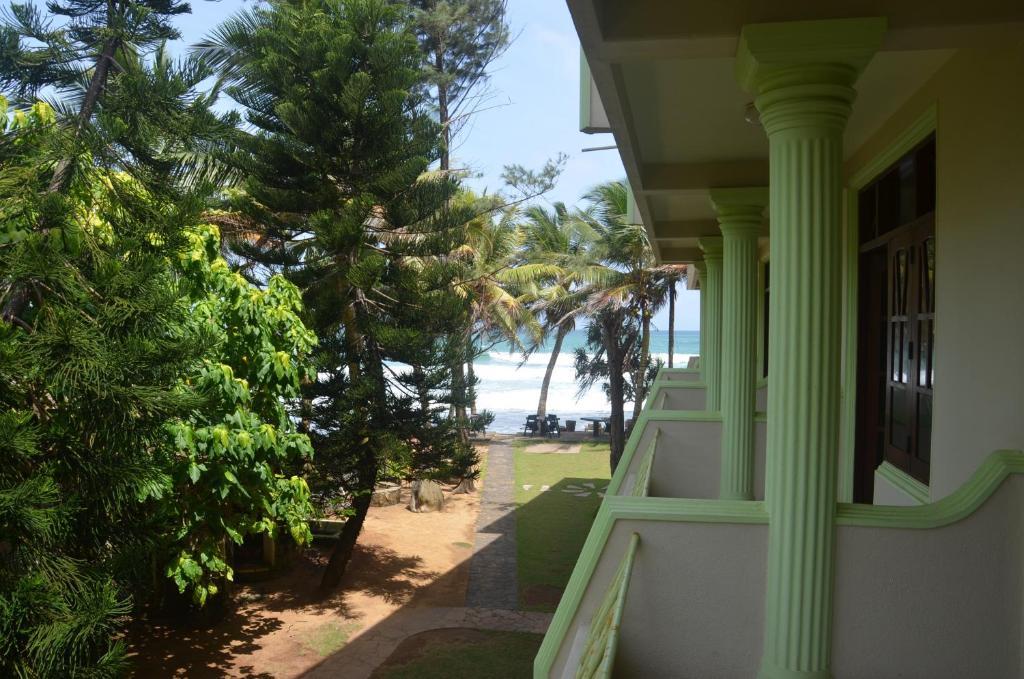 Time N Tide Beach Resort ฮิกคาดูวา ห้อง รูปภาพ