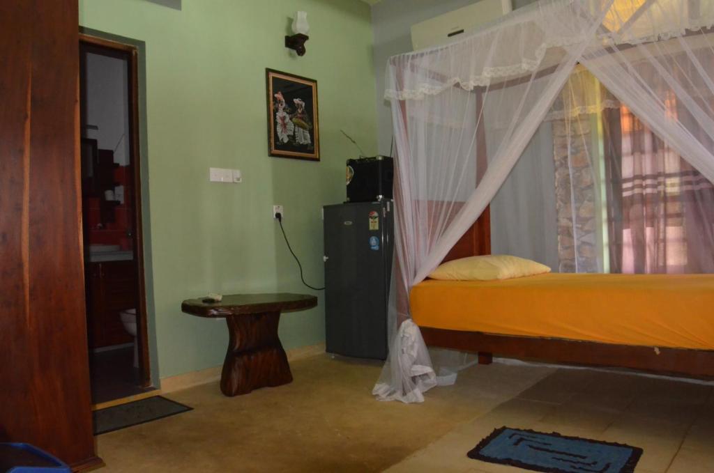 Time N Tide Beach Resort ฮิกคาดูวา ห้อง รูปภาพ